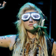 Illustration for article titled Feathered Hair Extensions Kill Thousands Of Roosters Each Week, And It's All Ke$ha's Fault